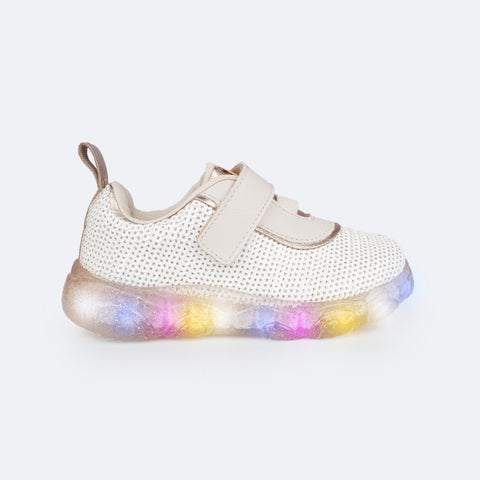 Tênis de Led Infantil Pampili Liz em Paetê Nude e Dourado - lateral do tenis com velcro e elástico