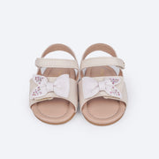 Sandália de Bebê Pampili Nana Laço Assimétrico Glitter e Strass Nude - frente da sandália com velcro, glitter e stras
