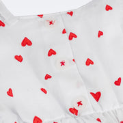 Vestido de Bebê Infanti Lastex Corações Branco e Vermelho - detalhe dos botões