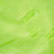 Short Saia Infantil Kukiê Desfiado Verde Neon - detalhe desfiado do short