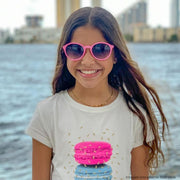Óculos de Sol Infantil KidSplash! Proteção UV Redondo Rosa - Foto na menina