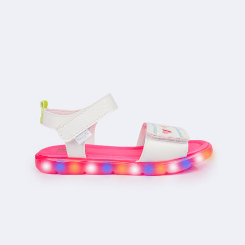 Sandália de Led Infantil Pampili Lulli Corações Branca e Rosa - lateral com led colorido aceso