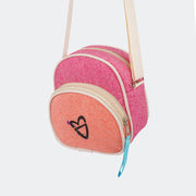 Bolsa Feminina Tweenie Eco Amigável Lona Reciclável Pink e Laranja - foto da bolsa pendurada na alça de gorgurão 